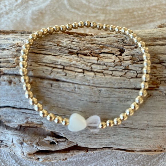 Heart 💘
Handmade 14k gold filled stretch onyx heart bracelet - Picture 5 of 7